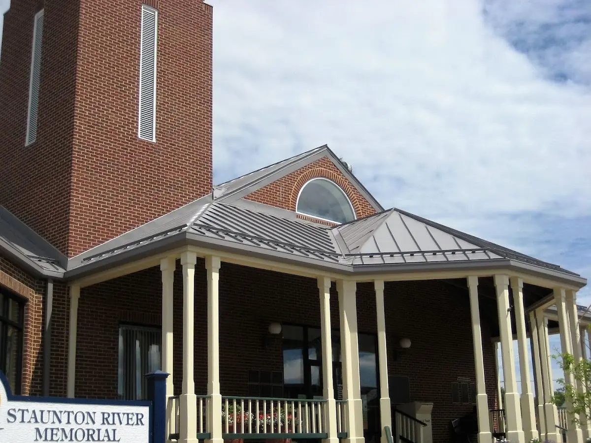 Skilled roofing craftsmen working on a residential roof in Rivers Bend